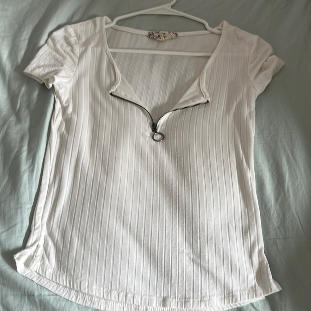 slightly off white tee with a zipper, size xs